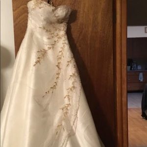 White gown with gold beads and sequins